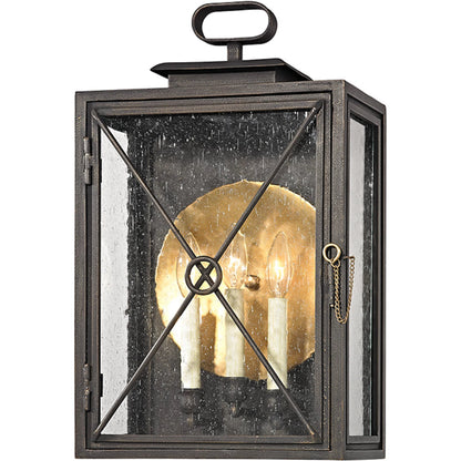 Randolph Wall Sconce by Troy in vintage bronze. Made from hand worked iron, brass in a transitional style.