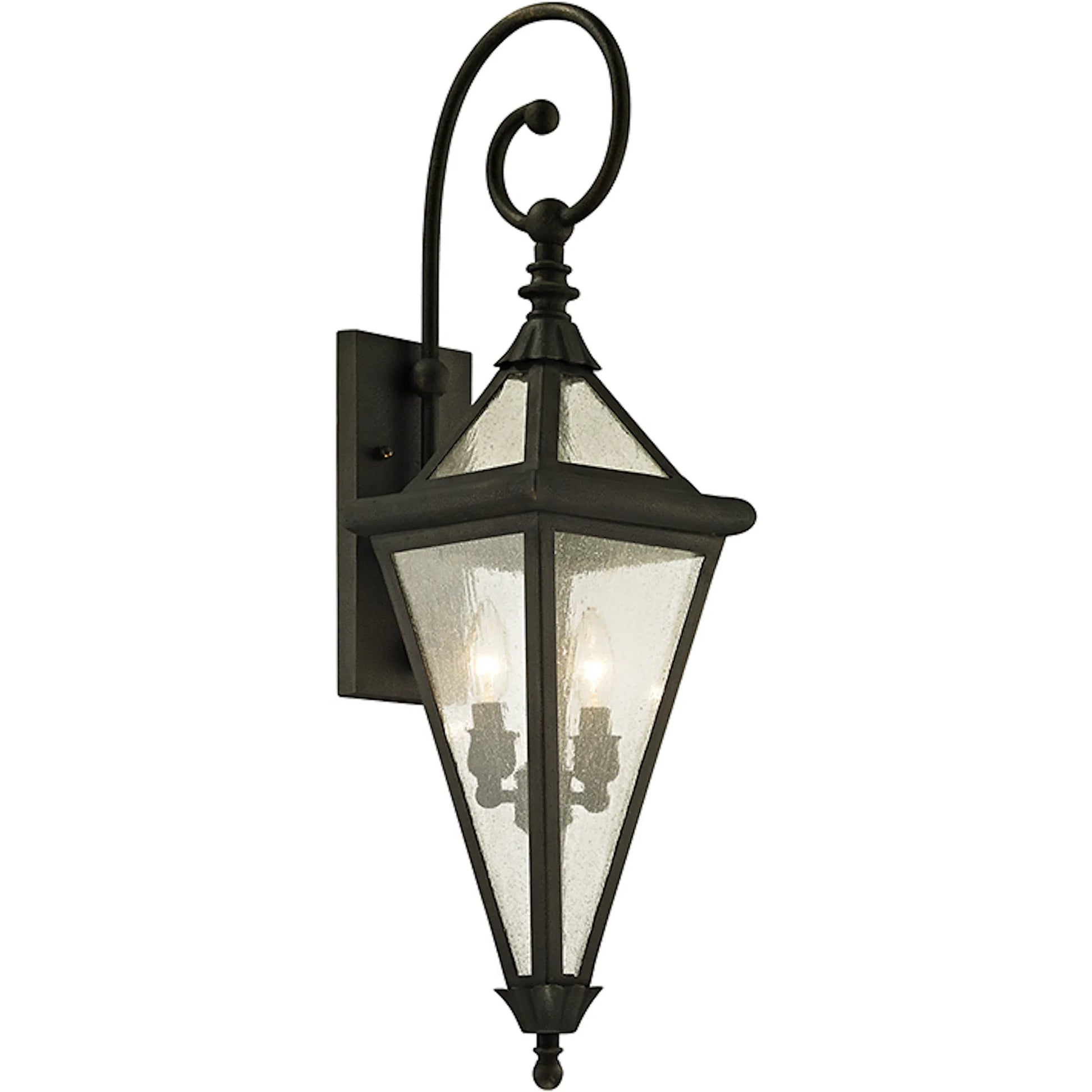 Geneva Wall Sconce by Troy in vintage bronze. Made from hand worked iron in a transitional style.
