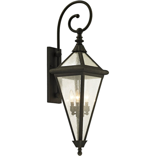 Geneva Wall Sconce by Troy in vintage bronze. Made from hand worked iron in a unique style.