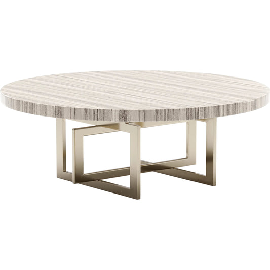 Wish You Were Here 48" Round Cocktail Table by Caracole in gold and whisper of gold. Made from stone in a modern style.