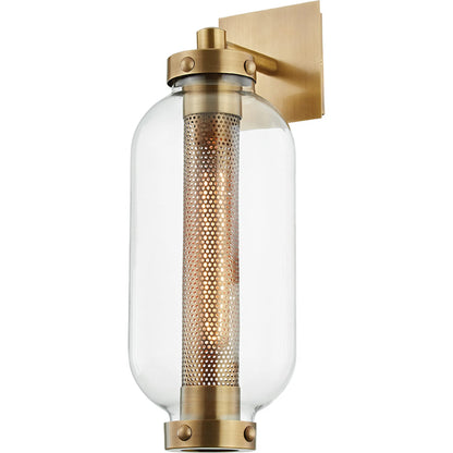 Atwater Wall Sconce by Troy in vintage brass. Made from solid brass in a modern style.