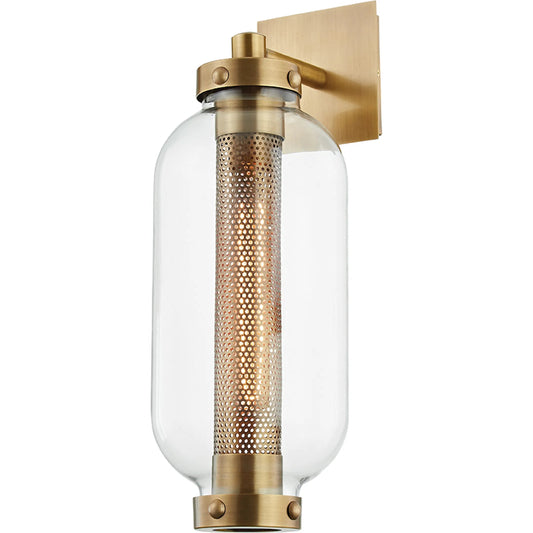 Atwater Wall Sconce by Troy in vintage brass. Made from solid brass in a modern style.
