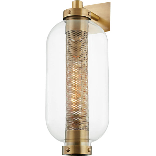 Atwater Wall Sconce by Troy in vintage brass. Made from solid brass in a modern style.