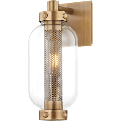 Atwater Exterior Wall Sconce by Troy in patina brass. Made from brass in a modern style.