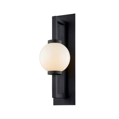 Darwin Wall Sconce by Troy in textured black. Made from hand worked aluminum in a modern style.