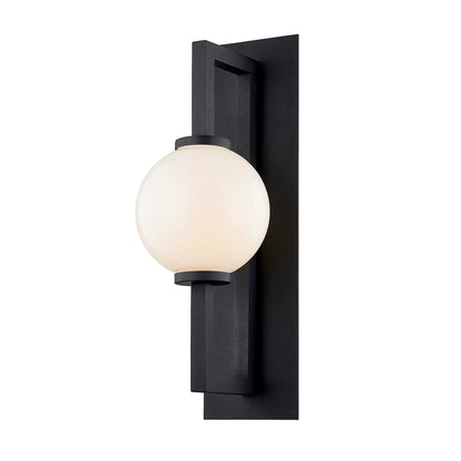 Darwin Wall Sconce by Troy in textured black. Made from hand worked aluminum in a modern style.