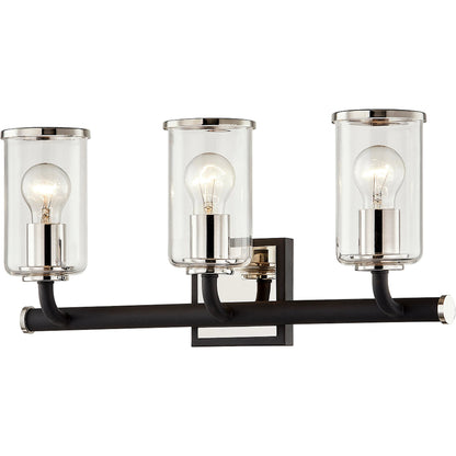 Aeon 3 Light Vanity Light by Troy in carbide blk, pol nickel. Made from hand worked iron in a modern style.