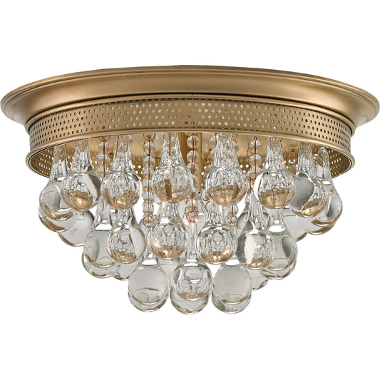 Worthing Flush Mount by Currey and Company in antique brass. Made from iron, crystal in a modern style.