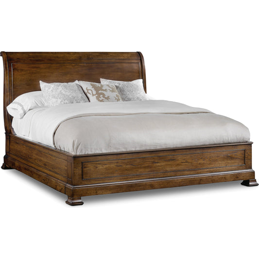 Archivist Sleigh Bed by Hooker Furniture in dark wood. Made from pecky pecan veneers in a traditional style.