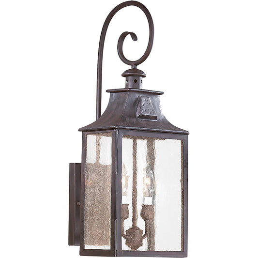 Newton Wall Sconce by Troy in soft off black. Made from hand forged iron in a unique style.