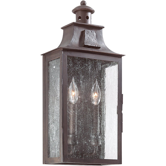 Newton Wall Pocket Lantern by Troy in old bronze. Made from hand forged iron in a unique style.