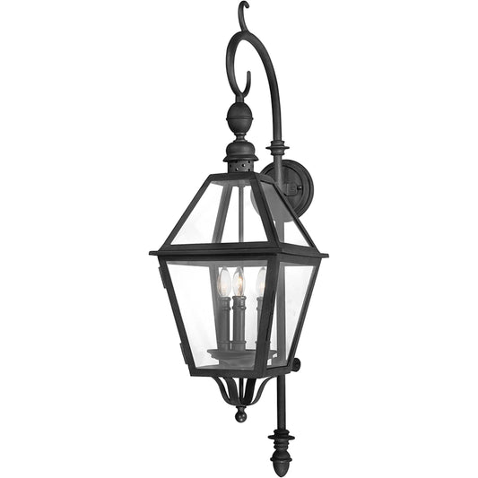 Townsend Hanging Wall Lantern by Troy in natural bronze. Made from hand worked iron in a traditional style.
