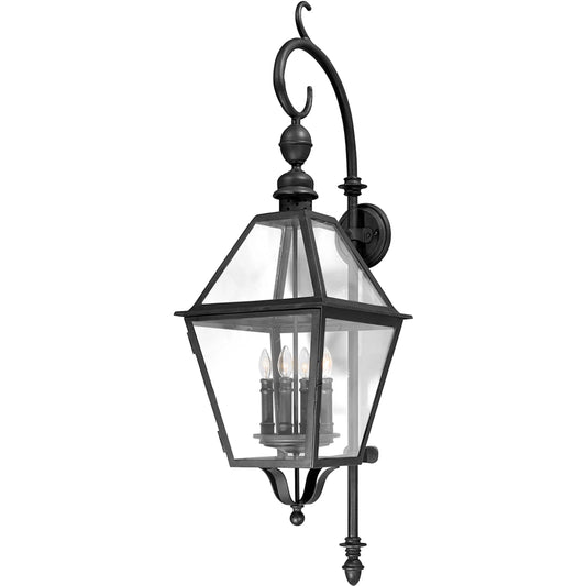 Townsend Hanging Wall Lantern by Troy in natural bronze. Made from hand worked iron in a traditional style.