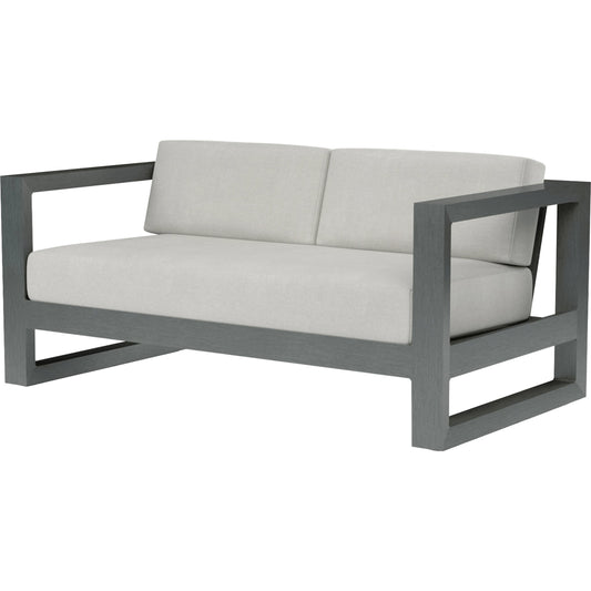 Redondo Outdoor Loveseat by Sunset West in slate. Made from aluminum in a modern style.