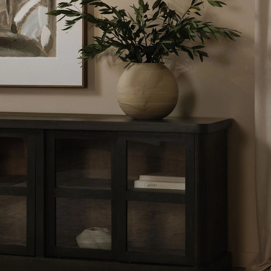 Mona Sideboard by Moe's Home Collection in black. Made from solid neem wood, tempered glass, pine veneer back in a unique style.