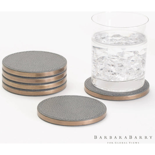 Alpen Coasters by Global Views. Made from mdf, brass, leather, polyester suede in a transitional style.