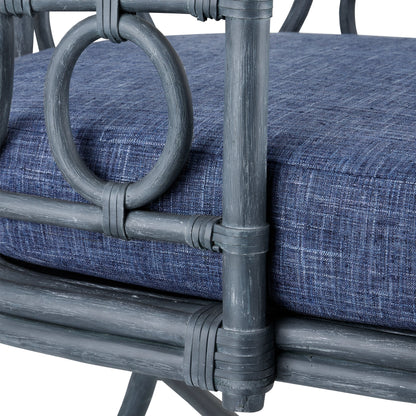 Tegal Chair by Currey and Company in vintage navy, indigo. Made from rattan, plywood, fabric, foam in a coastal style.