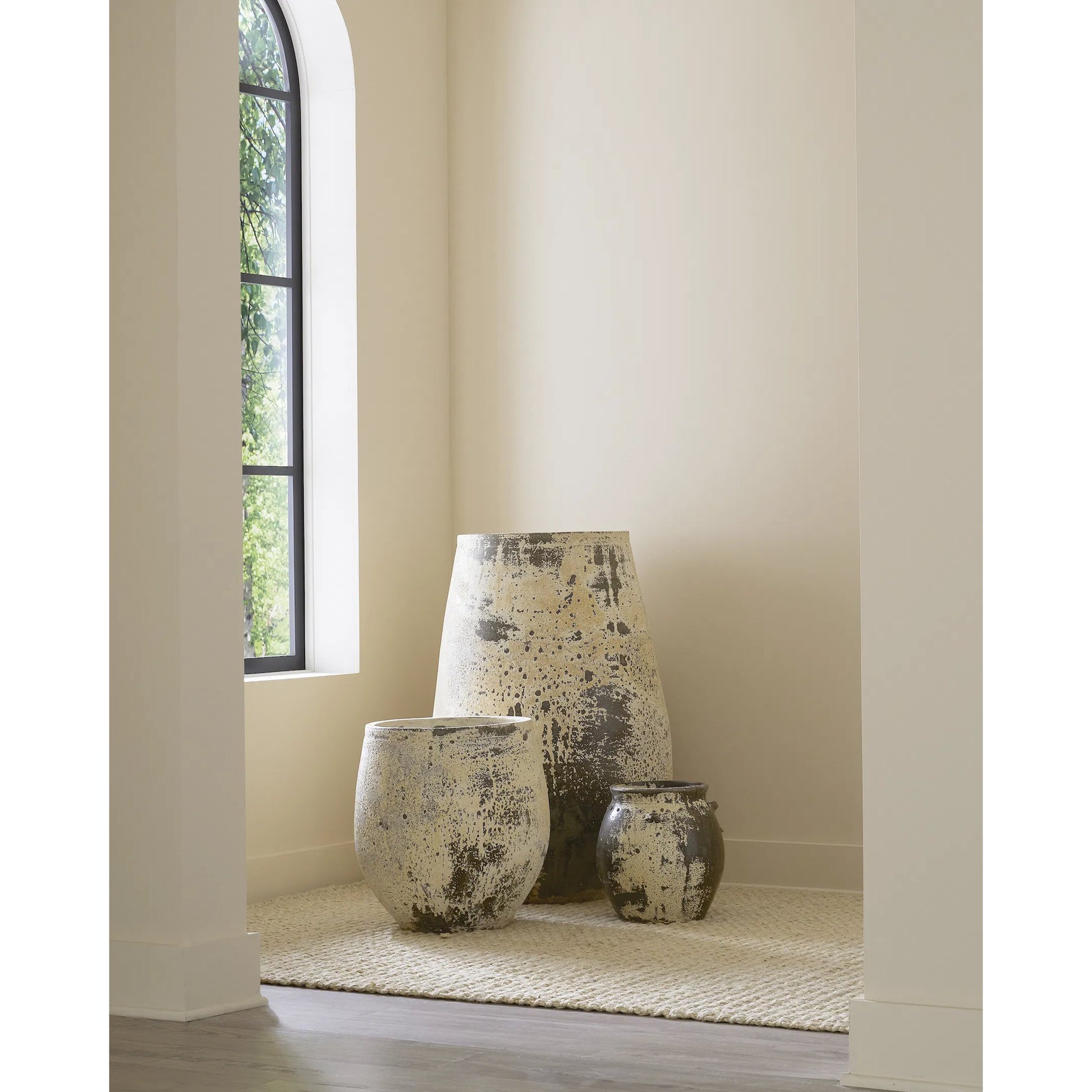 Sicilia Antique White Planter by Currey and Company in greenish white. Made from terracotta in a modern style.