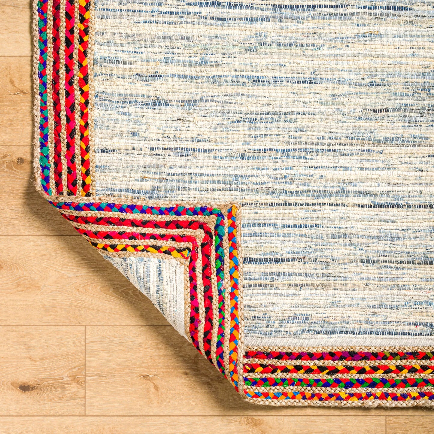 002 SI-1921822,SI-1921823,SI-1921824,SI-1921825,SI-1921826,SI-1921827 | Closeup | Billie BBI-2301 Rug by Livabliss in tan, dark blue, blue, light blue, beige. Made from main: 85% recycled fabric, main: 15% jute in a unique style.