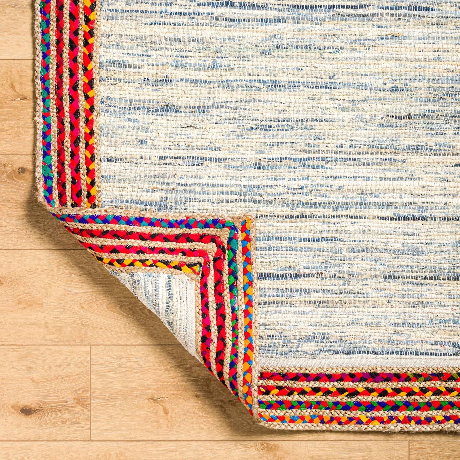 Billie BBI-2301 Rug by Livabliss in tan, dark blue, blue, light blue, beige. Made from main: 85% recycled fabric, main: 15% jute in a unique style.