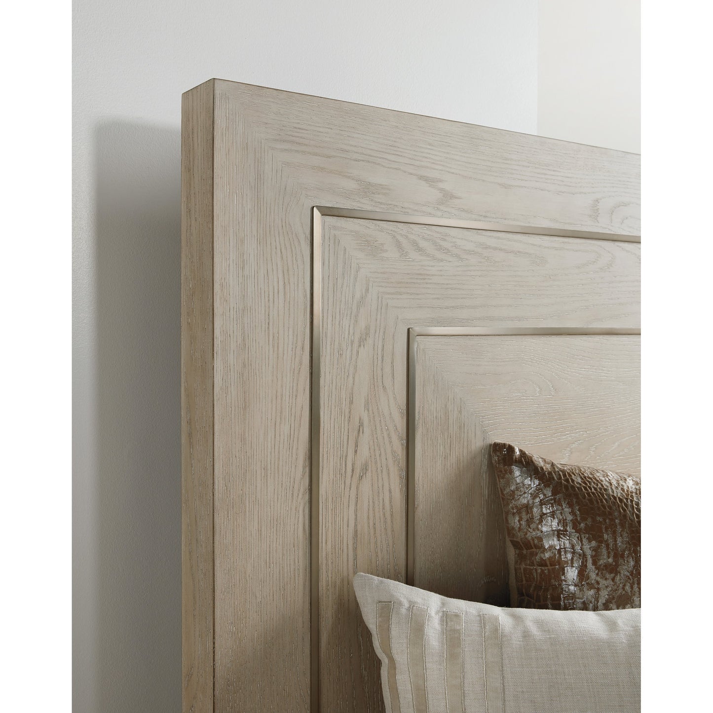 002 SI-1748542,SI-1748543,SI-1748544 | Closeup | Cascade Bed by Hooker Furniture in terrain. Made from oak veneers, metal inlay in a traditional style.