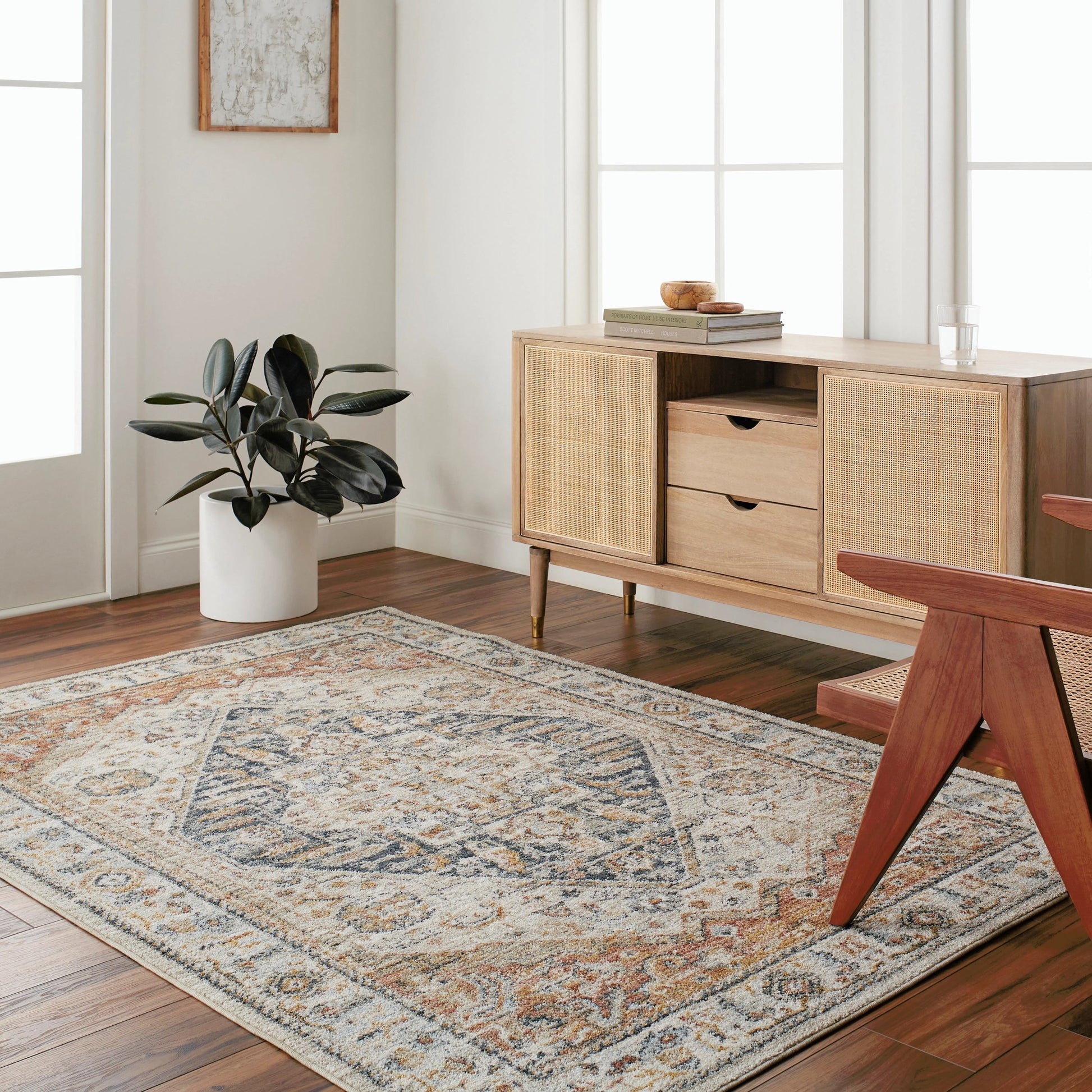 Beckham Rug by Livabliss in off-white, amber, charcoal, light slate, ice blue, medium brown. Made from main: 100% polyester in a traditional style.