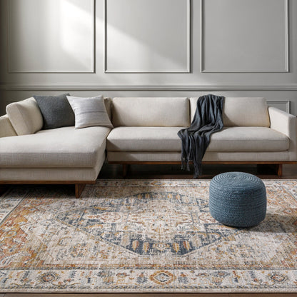 Beckham Rug by Livabliss in off-white, amber, charcoal, light slate, ice blue, medium brown. Made from main: 100% polyester in a traditional style.