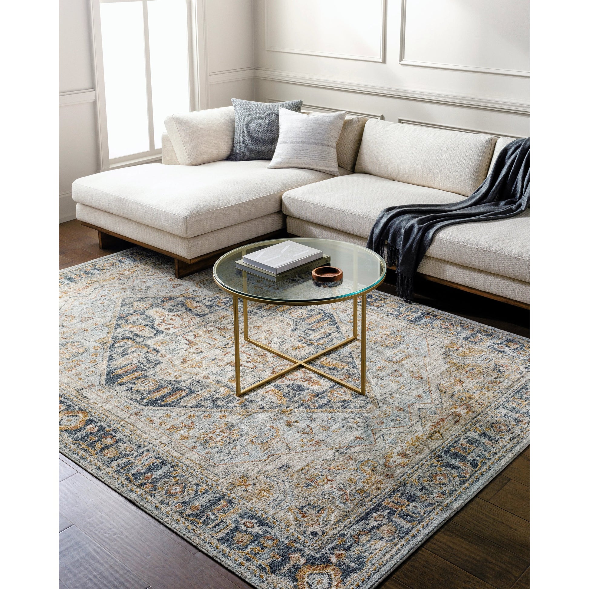 Beckham Rug - 33060 by Livabliss in charcoal, off-white, light slate, ice blue, amber, medium brown. Made from main: 100% polyester in a unique style.