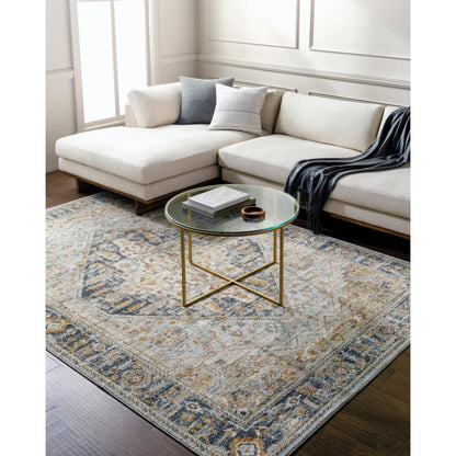 Beckham Rug - 33060 by Livabliss in charcoal, off-white, light slate, ice blue, amber, medium brown. Made from main: 100% polyester in a unique style.
