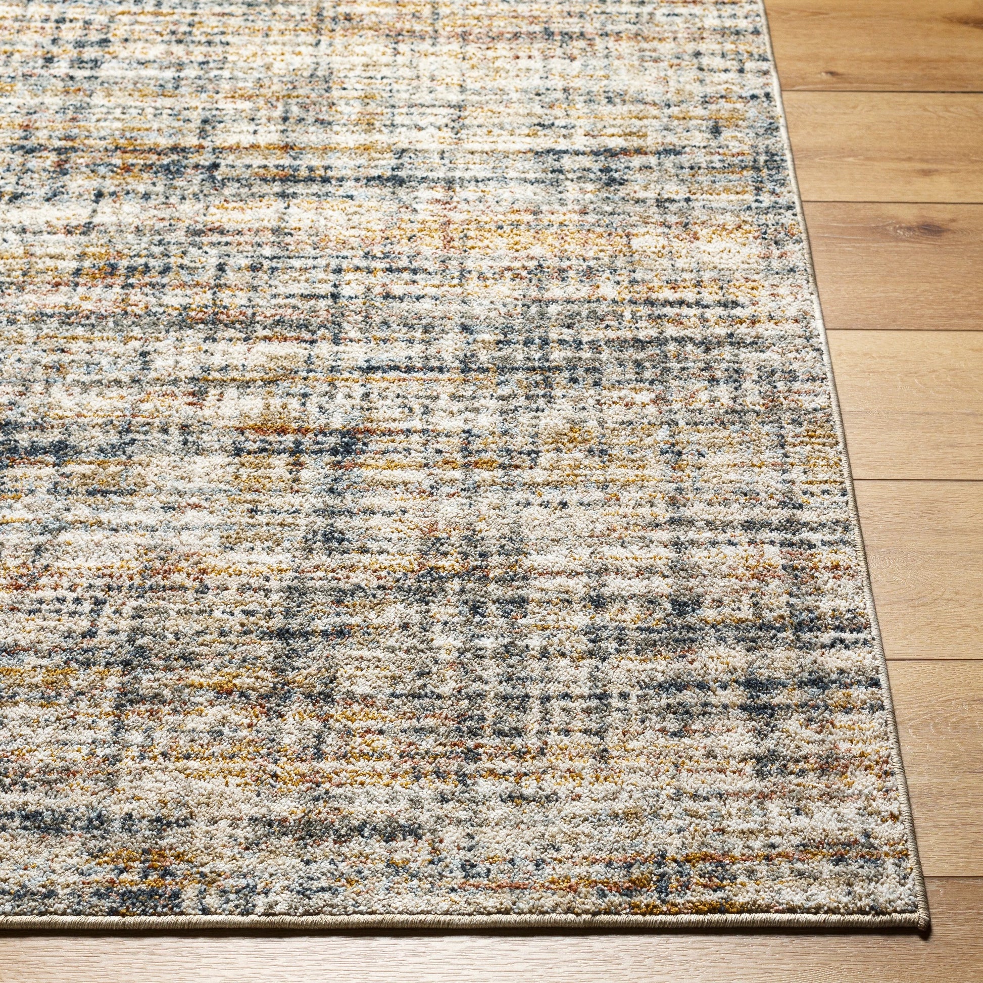 Beckham Rug - 33070 by Livabliss in off-white, light slate, ice blue, charcoal, amber, medium brown. Made from main: 100% polyester in a unique style.