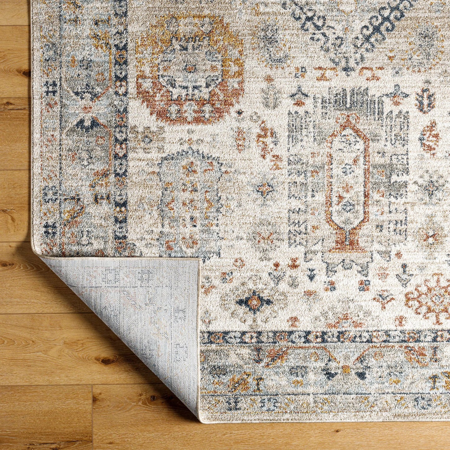 003 SI-1971530,SI-1971535,SI-1971536 | Closeup | Beckham BCM-2313 Rug by Livabliss in off-white, medium gray, ice blue, charcoal, amber, medium brown. Made from main: 100% polyester in a unique style.