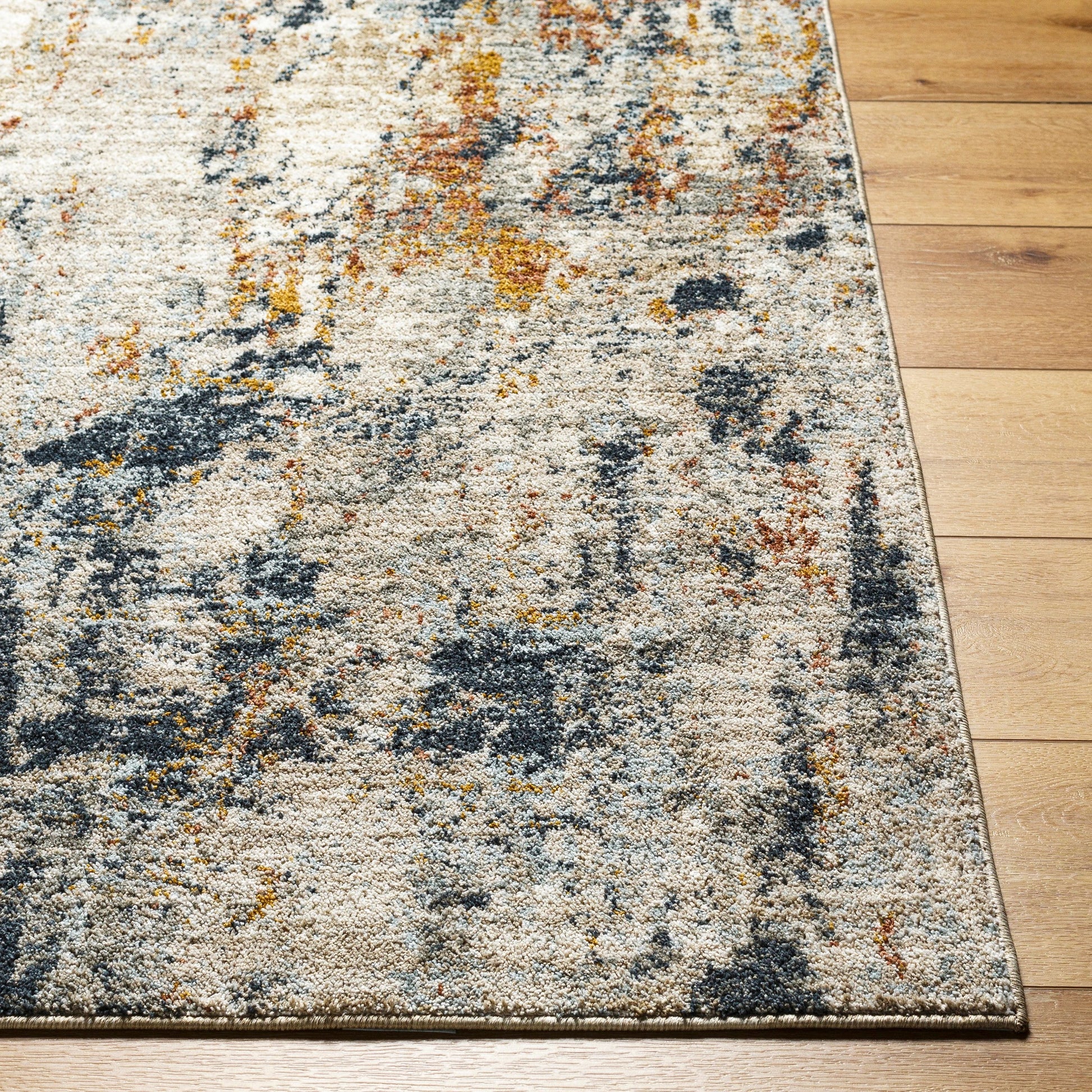 Beckham Rug - 33078 by Livabliss in light slate, off-white, ice blue, charcoal, medium brown, amber. Made from main: 100% polyester in a unique style.