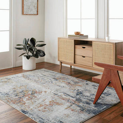 Beckham Rug - 33078 by Livabliss in light slate, off-white, ice blue, charcoal, medium brown, amber. Made from main: 100% polyester in a unique style.