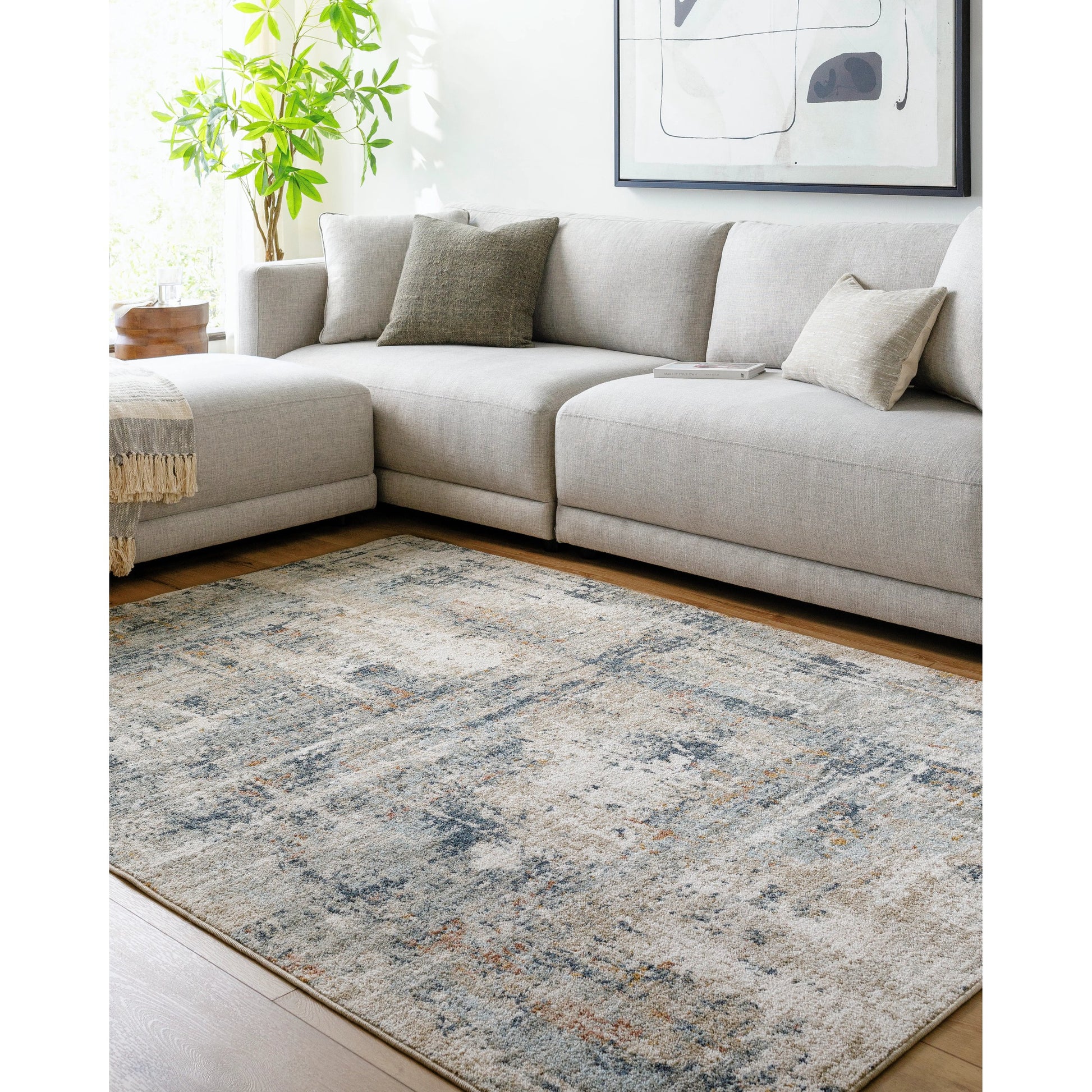 Beckham Rug - 33080 by Livabliss in medium gray, off-white, charcoal, ice blue, medium brown, amber. Made from main: 100% polyester in a unique style.