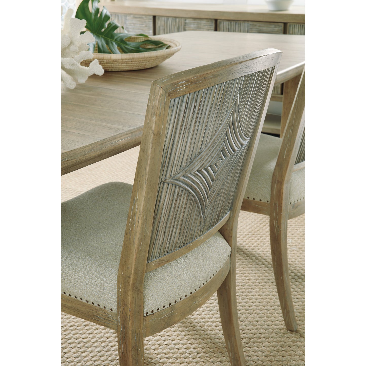 003 SI-1749835 | Closeup | Surfrider Carved Back Side Chair (Set of 2) by Hooker Furniture in beige and driftwood, zuri cream. Made from fabric, foam, resin, nailheads in a traditional style.