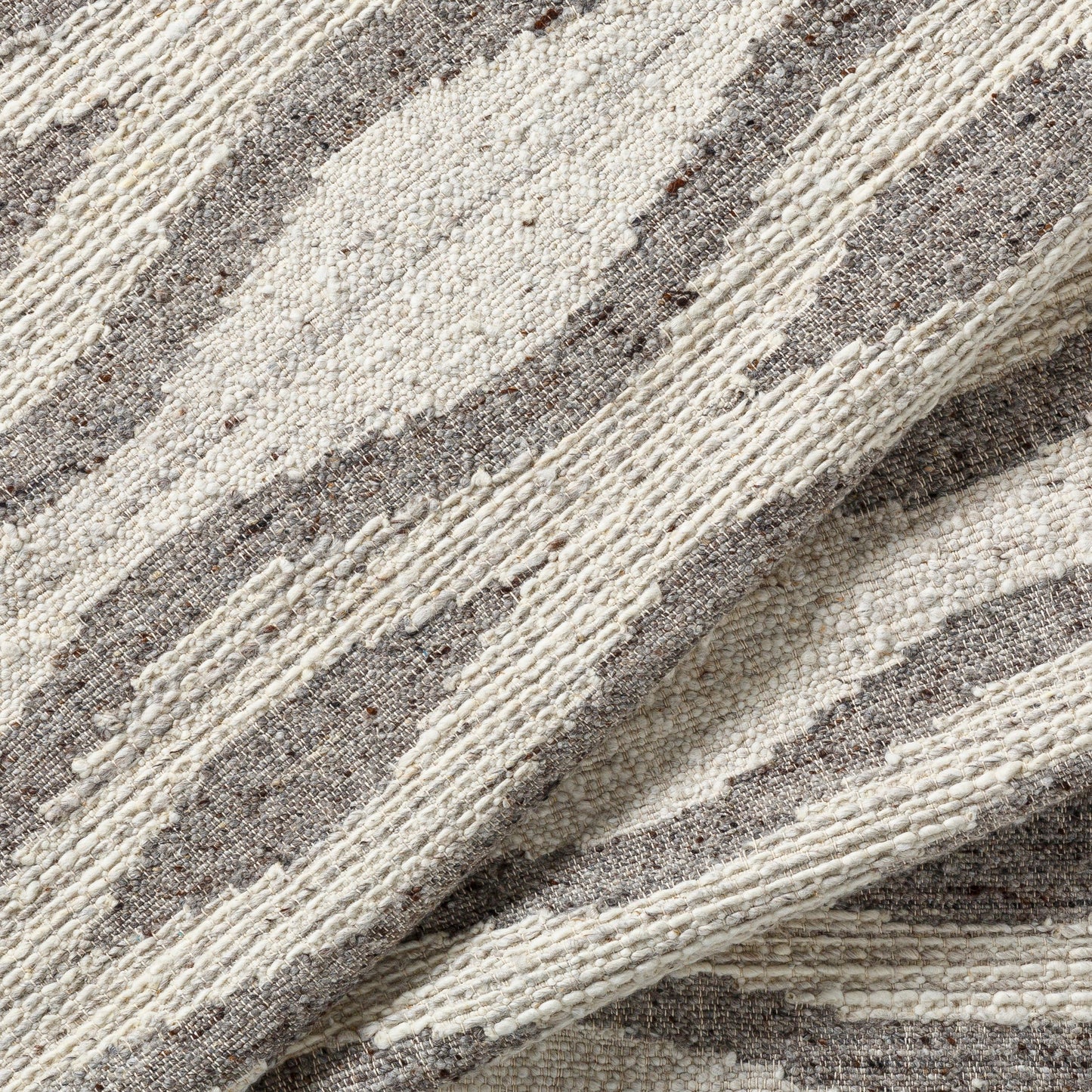 004 SI-1826289,SI-1826290,SI-1826291,SI-1826292 | Closeup | Bremen Rug - 29470 by Surya in cream, gray, charcoal, brown. Made from 100% wool in a unique style.