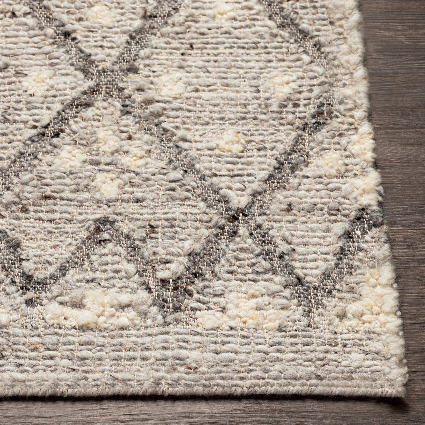 004 SI-1878141,SI-1878142,SI-1878143,SI-1878144 | Closeup | Bremen Rug - 29472 by Surya in light slate, cream, gray, charcoal, brown. Made from 100% wool in a unique style.