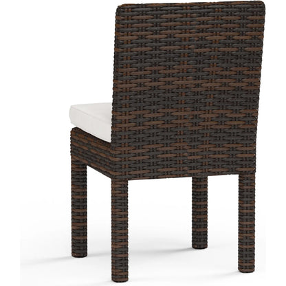 Montecito Outdoor Armless Dining Chair by Sunset West in cognac. Made from resin wicker in a modern style.