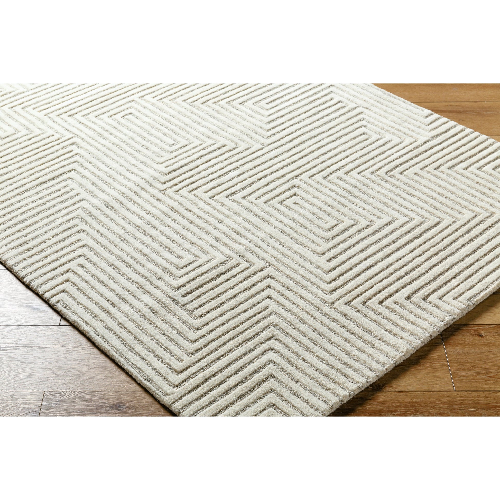 Brook Handmade Rug by Livabliss. Made from wool in a rustic style.