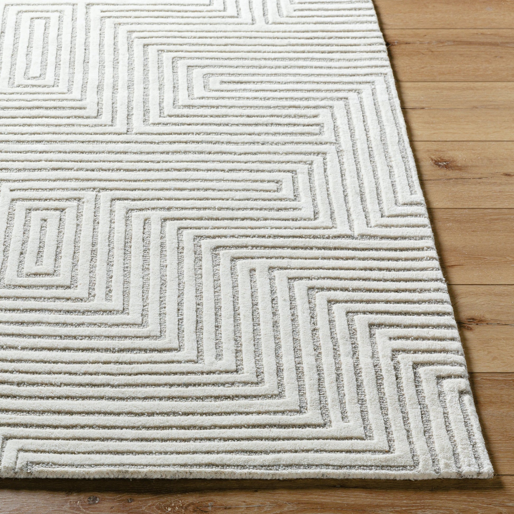 Brook Handmade Rug by Livabliss. Made from wool in a rustic style.