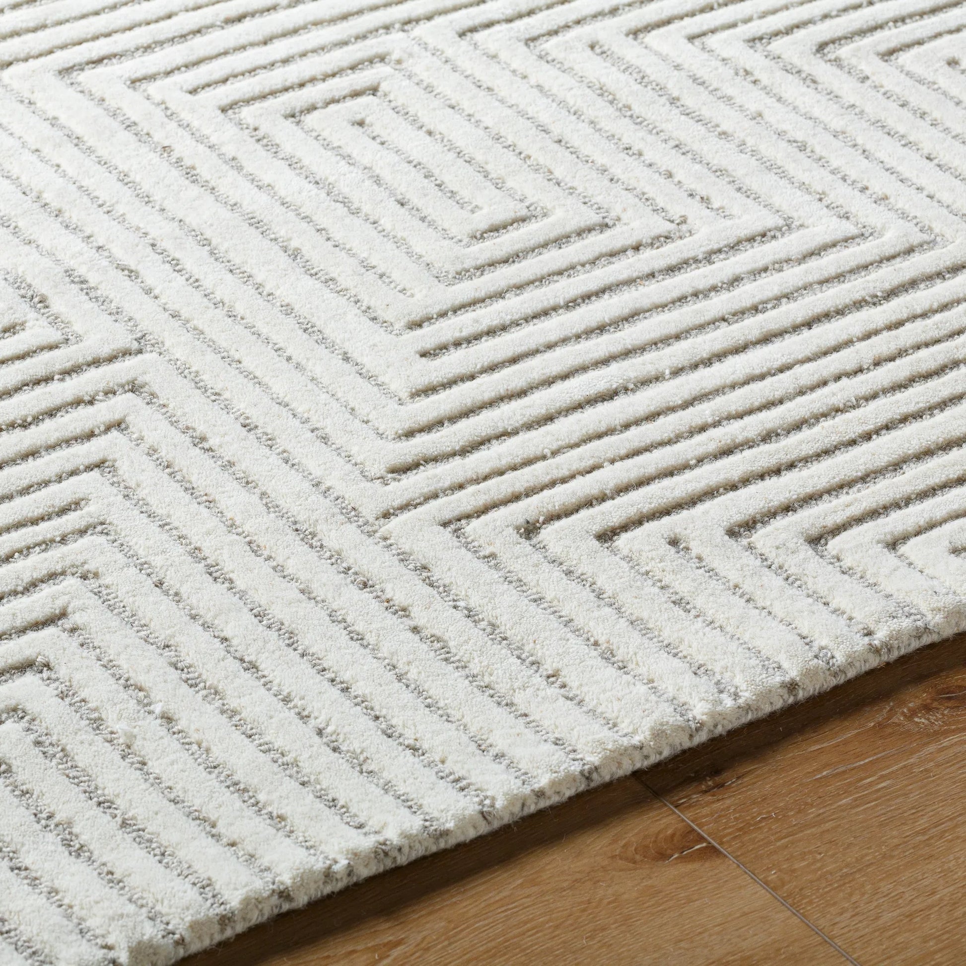 Brook Handmade Rug by Livabliss. Made from wool in a rustic style.