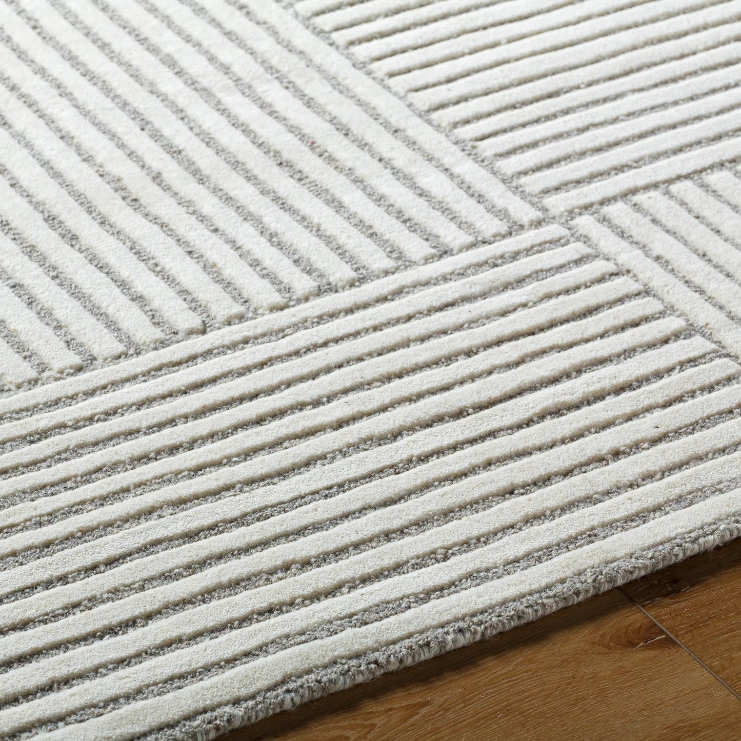 004 SI-2133443,SI-2133444,SI-2133445,SI-2133446 | Closeup | Brook Rug - 8494 by Livabliss in cream, medium gray. Made from face: 100% wool in a unique style.