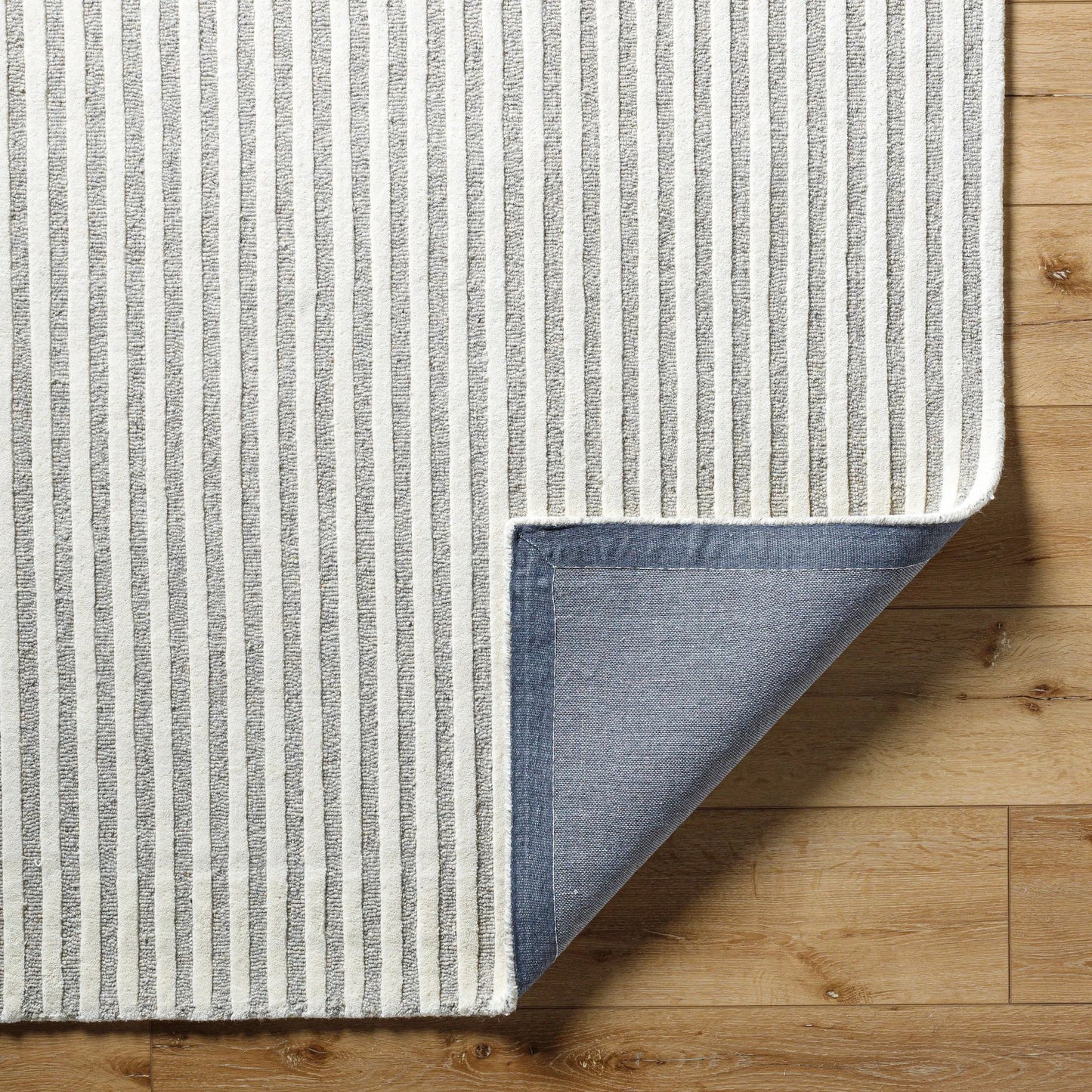 005 SI-2131623,SI-2131624,SI-2131625,SI-2131626 | Closeup | Brook Rug - 485593 by Livabliss in cream, medium gray. Made from face: 100% wool, warp: 100% cotton in a unique style.