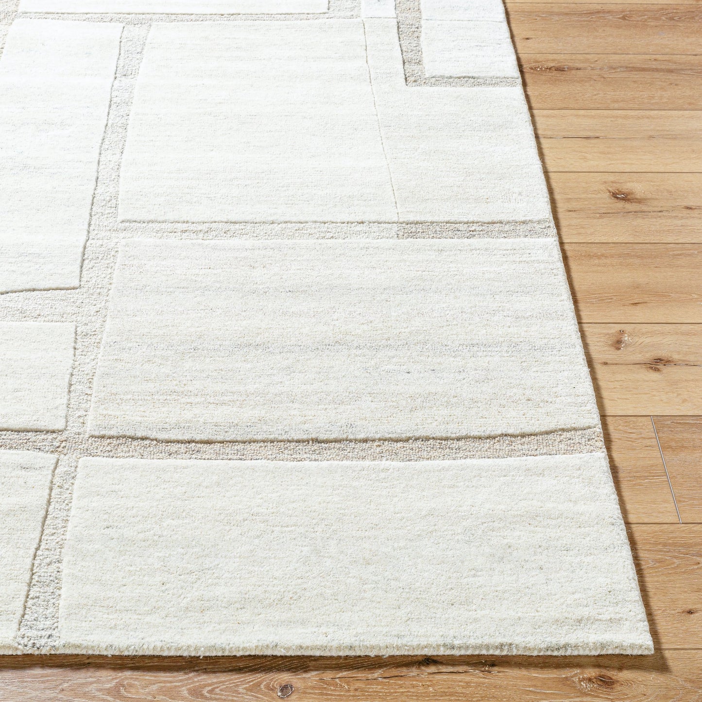 002 SI-2167658,SI-2167659,SI-2167660,SI-2167661 | Closeup | Brook Rug - 489139 by Livabliss in ivory, light beige, denim. Made from wool in a unique style.