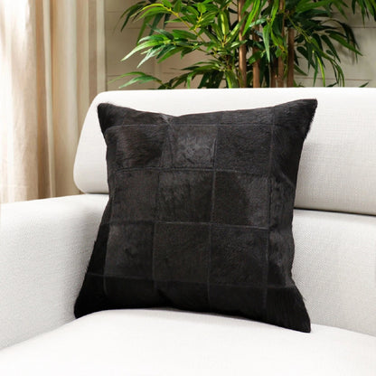 Safari Checkered Cowhide Throw Pillow by Pasargad Home. Made from cowhide in a modern style.