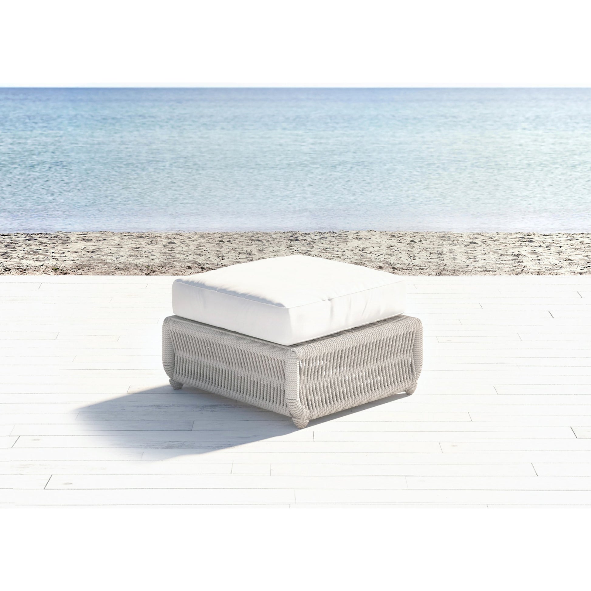 Dana Outdoor Rope Ottoman in Linen by Sunset West in natural. Made from olefin rope in a coastal style.