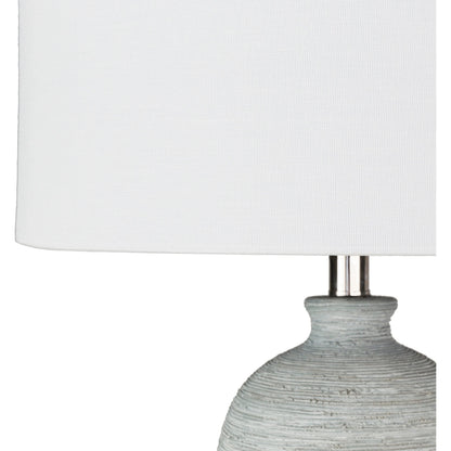 Blaine - 21516 by Surya in clear, light gray, metallic nickel and hand finished. Made from linen, polyester, concrete, acrylic, metal in a coastal style.