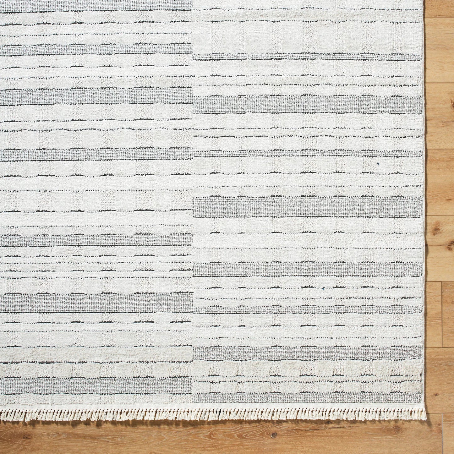 005 SI-2167771,SI-2167772,SI-2167773,SI-2167774 | Closeup | Berlin Rug - 494659 by Livabliss in ivory, black. Made from polypropylene, polyester in a unique style.