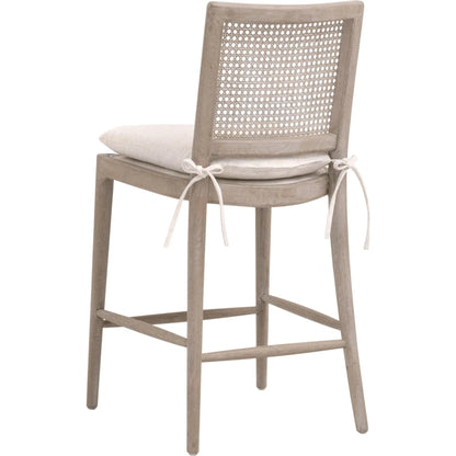 Blume Counter Stool by Essentials For Living in performance textured cream linen, natural gray oak, cane. Made from solid oak wood, cane in a transitional style.