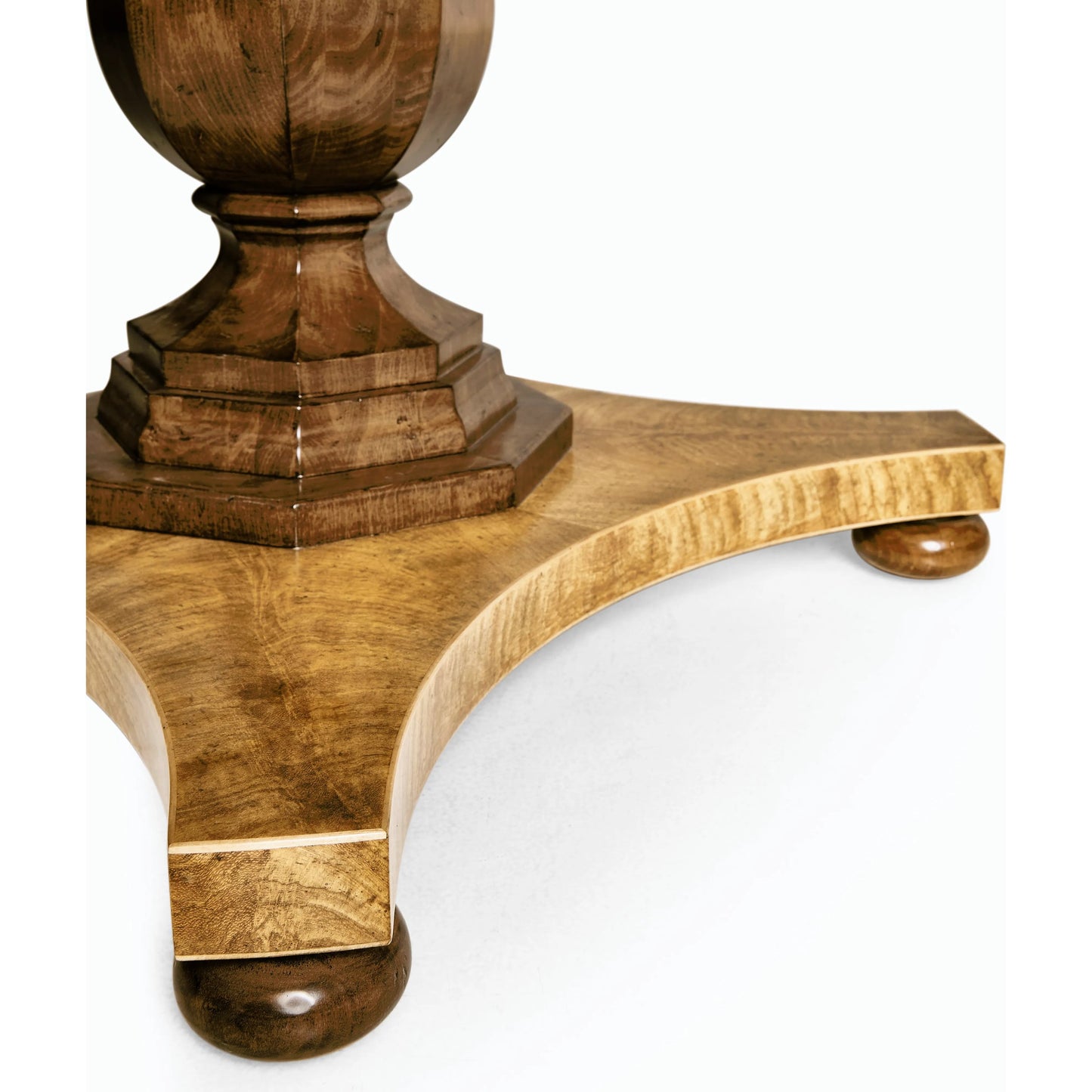 009 SI-2186348 | Closeup | Vermeer Round Pedestal Dining Table by Jonathan Charles in brown and natural cerejeira. Made from alder, crotch cerajeria veneers, quartered acacia veneers in a traditional style.